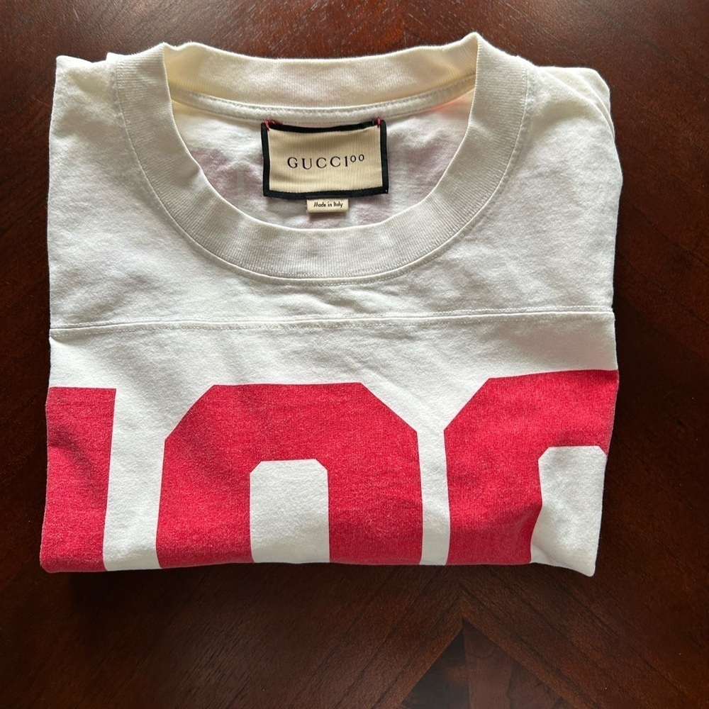 Gucci White Tee with Red Number Design UNISEX
100 music is mine - Picture 10 of 10
